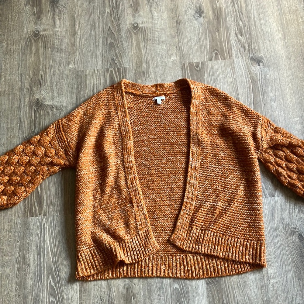 Orange and white knitted sweater. Size extra extra large from nine west.